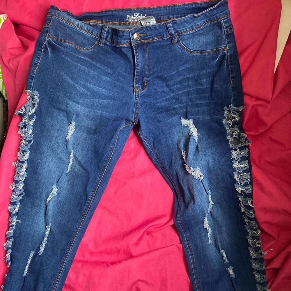 Ripped dark wash denim jeans